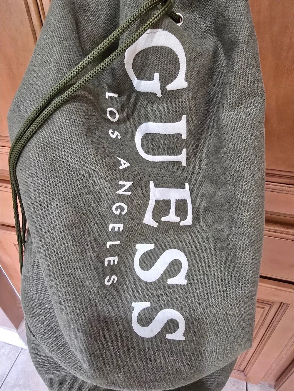 GUESS Olive Green Canvas Drawstring Sling Backpack